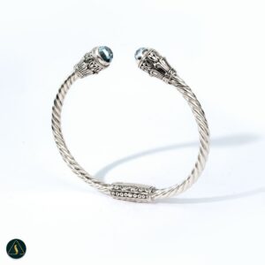 sterling silver twisted cable cuff bracelet with blue topaz gemstones