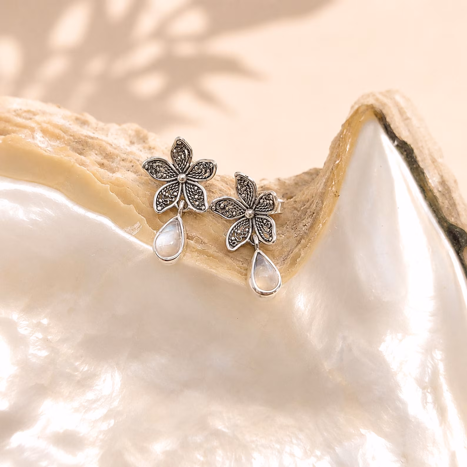 925 Sterling Silver Teardrop Gemstone Earrings Close Up Balinese artisan flower gemstone dangle jewelry