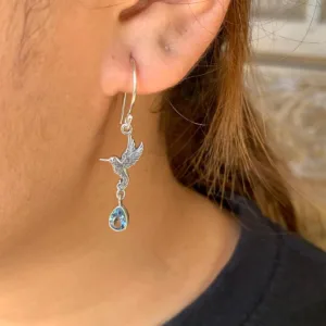 close up of Balinese sterling silver hummingbird earrings