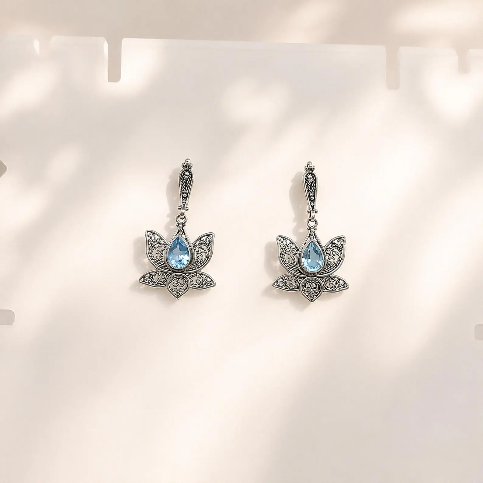 Balinese Sterling Silver Lotus Filigree Earrings Close Up lotus gemstone dangle earrings handmade in Bali