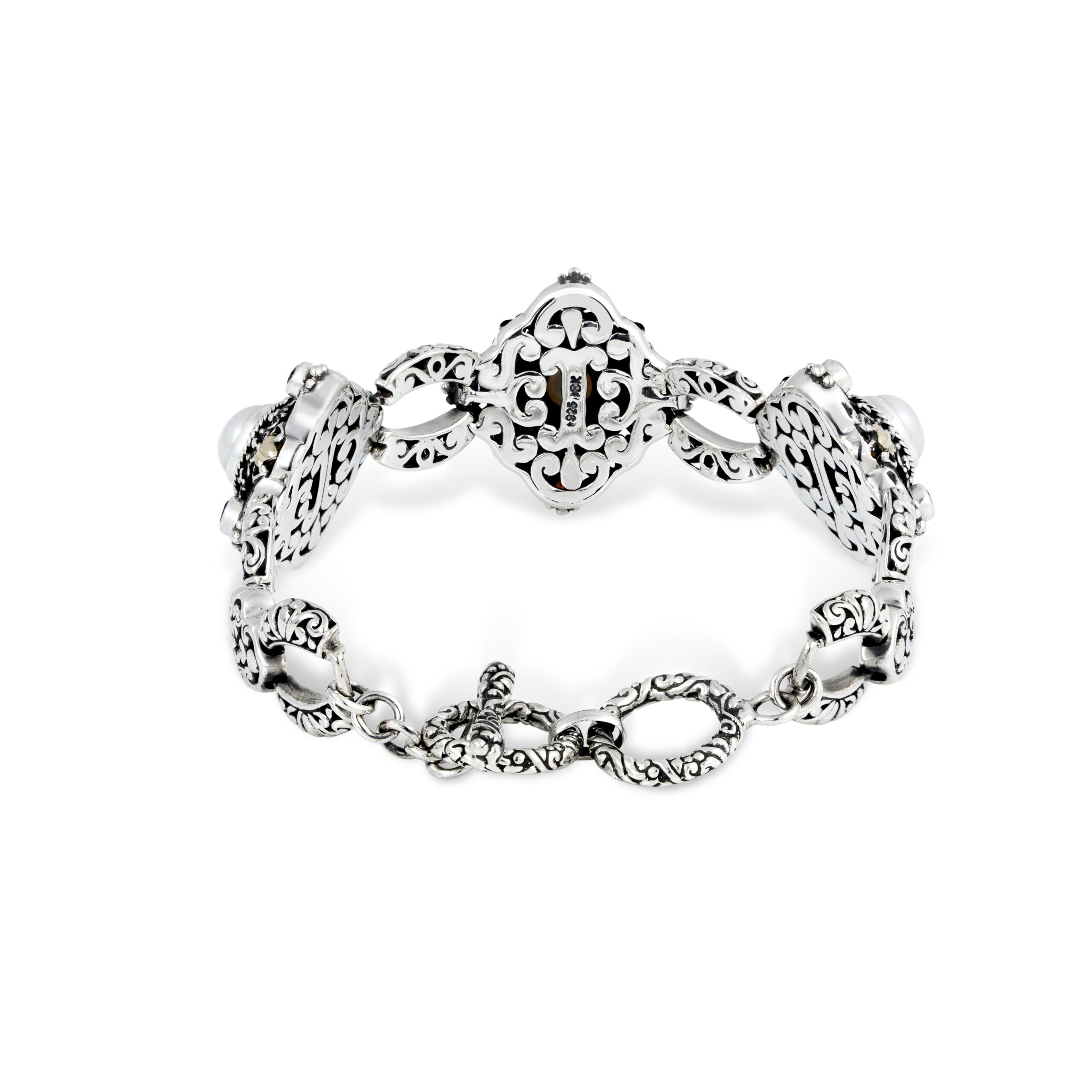 925 Sterling Silver Link Bracelet with Gold-Plated Accents Close-up of intricate filigree details on a handcrafted Indonesian sterling silver gemstone bracelet