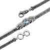 detailed sterling silver octopus bracelet with blue topaz and 18K gold accents