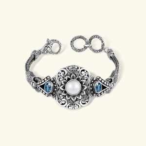925 sterling silver pearl bracelet with blue topaz accents