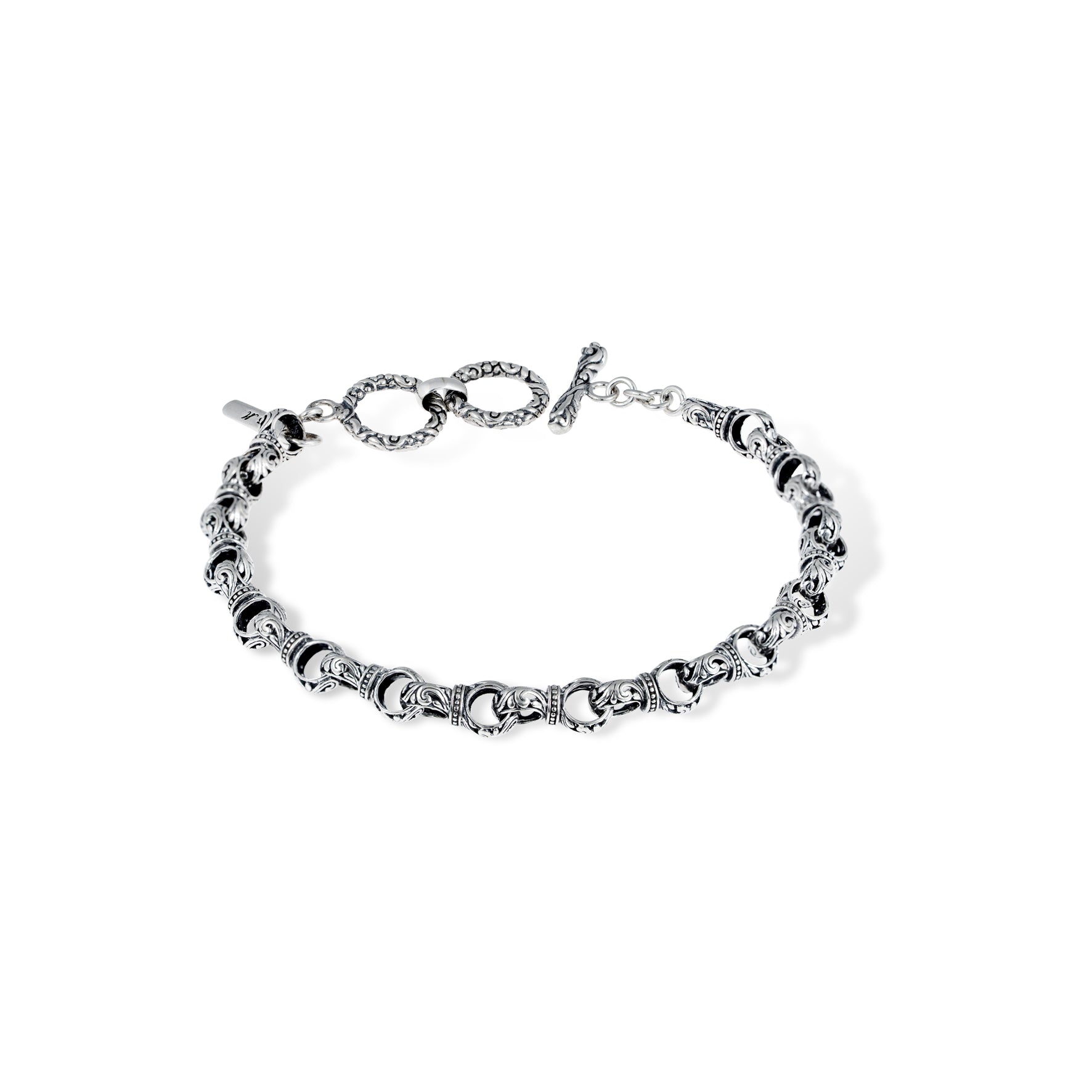 Handmade Balinese Silver Bracelet with Floral Scrollwork handmade Balinese sterling silver bracelet with intricate scrollwork links