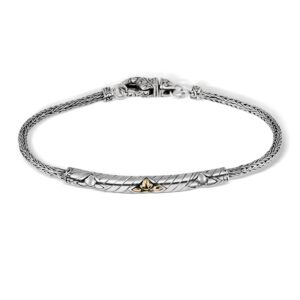 engraved sterling silver bracelet with 18K gold accent and ornamental details