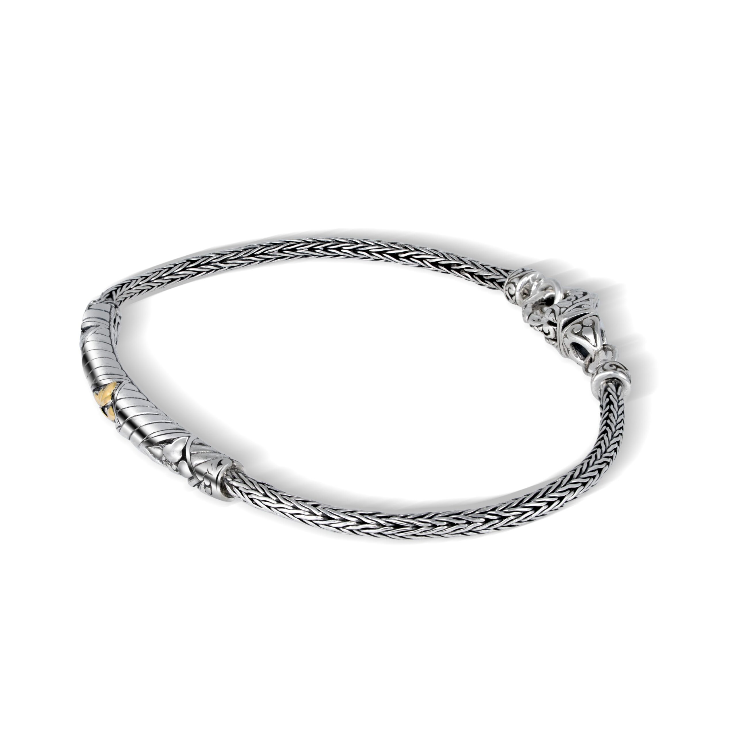 Balinese Braided Silver Bracelet with 18K Gold Detail Balinese braided sterling silver bracelet with subtle 18K gold detail