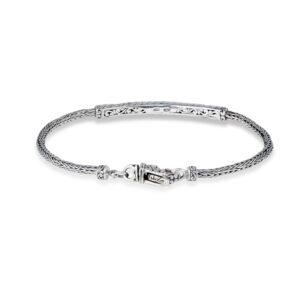 handcrafted sterling silver bracelet with 18K gold accent and braided chain