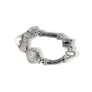 Balinese sterling silver bracelet with intricate scrollwork and pearl center