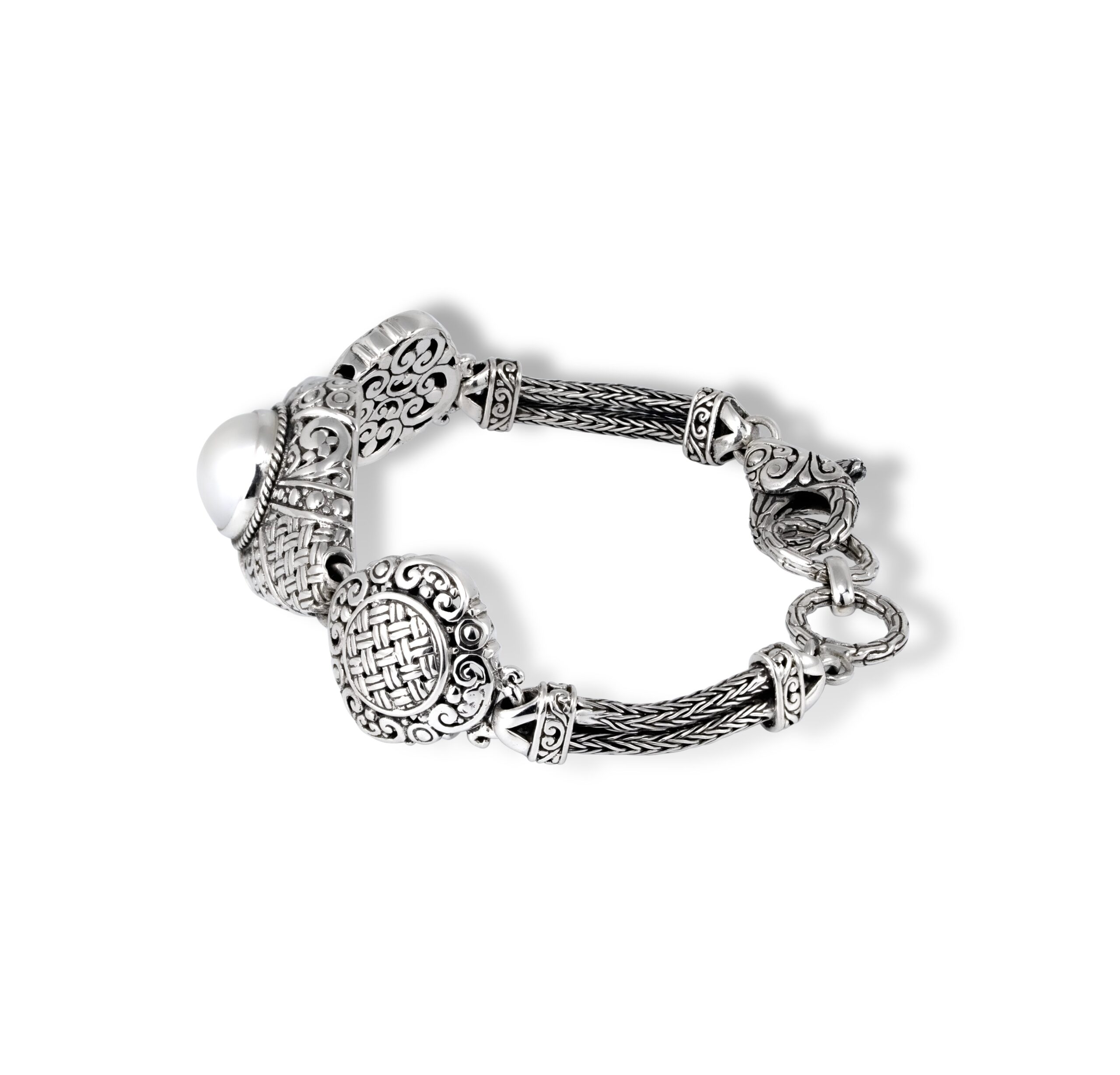 Balinese Sterling Silver Bracelet with Pearl Center Balinese sterling silver bracelet with intricate scrollwork and pearl center