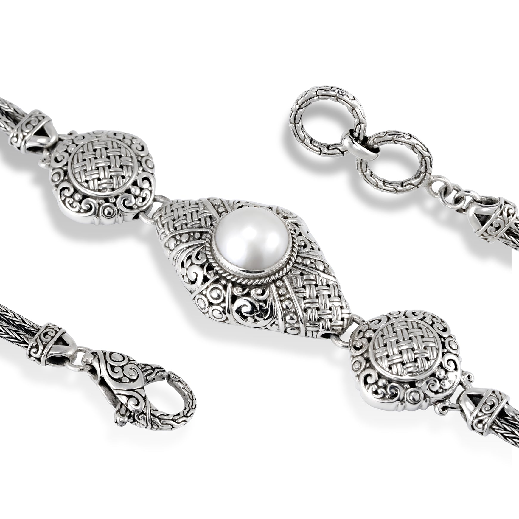 Balinese Silver Bracelet Scrollwork and Pearl Detail detailed Balinese silver bracelet with scrollwork and pearl centerpiece