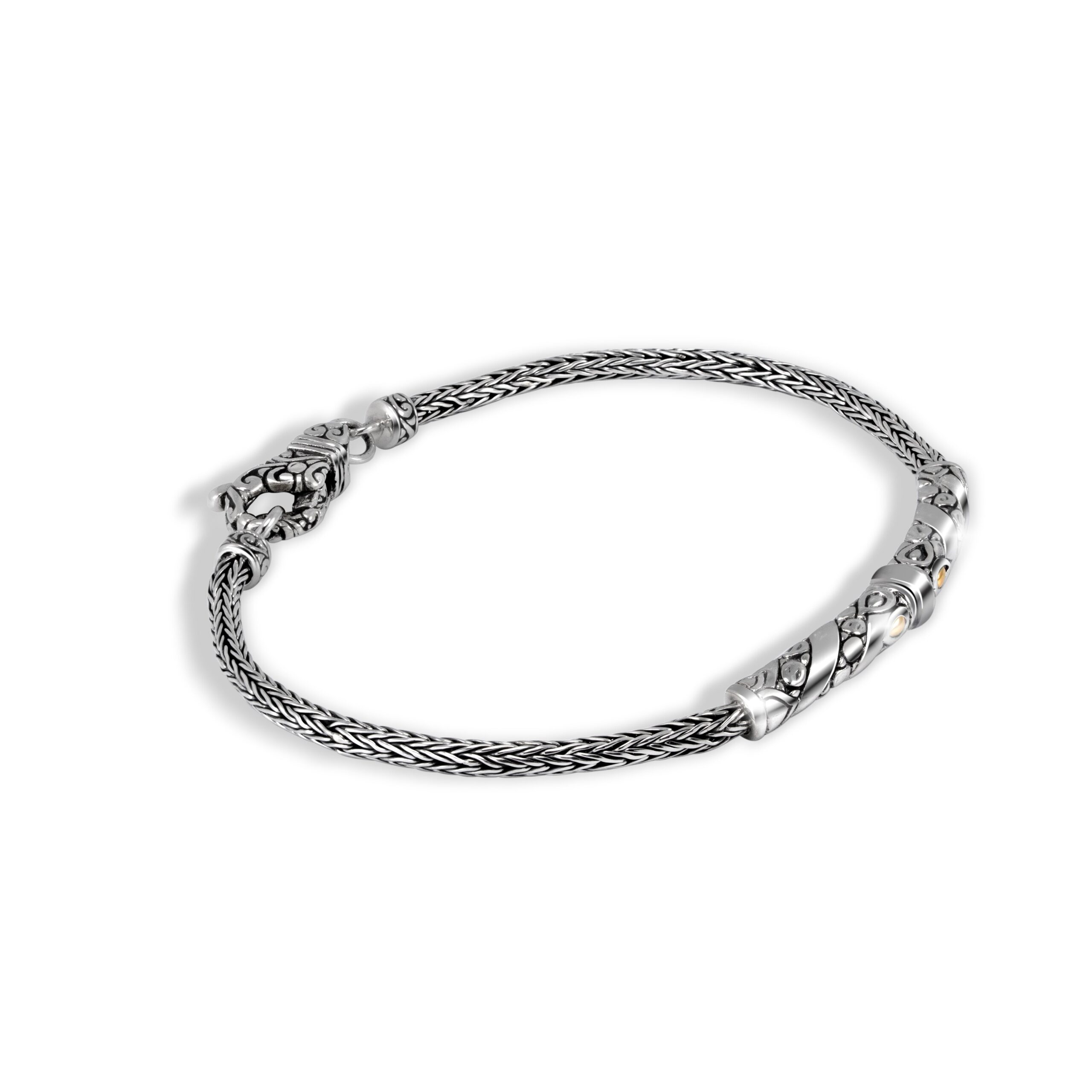 Balinese Silver Bracelet with 18K Gold Balinese silver bracelet with 18K gold accents and braided chain