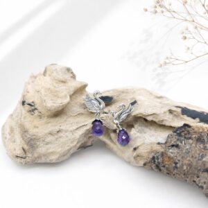 925 sterling silver swan earrings close up with amethyst