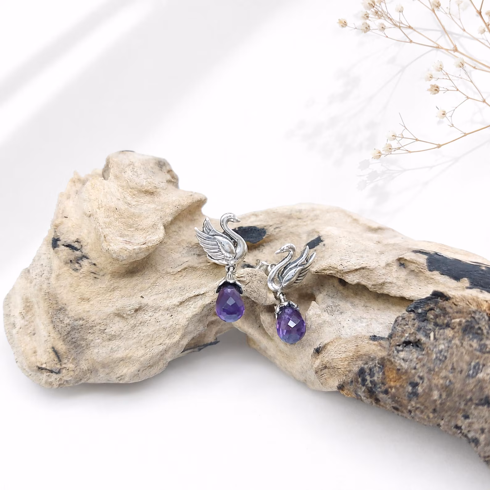 Handmade Balinese Swan Sterling Silver Earrings with Amethyst 925 sterling silver swan earrings close up with amethyst