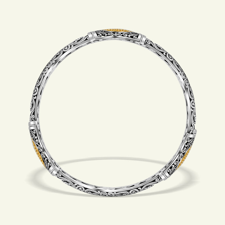 Indonesian 925 Silver Bangle with Gold-Plated Center Indonesian 925 silver bangle bracelet with gold plated detail