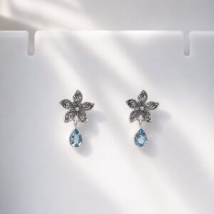 925 sterling silver flower earrings with gemstone close up