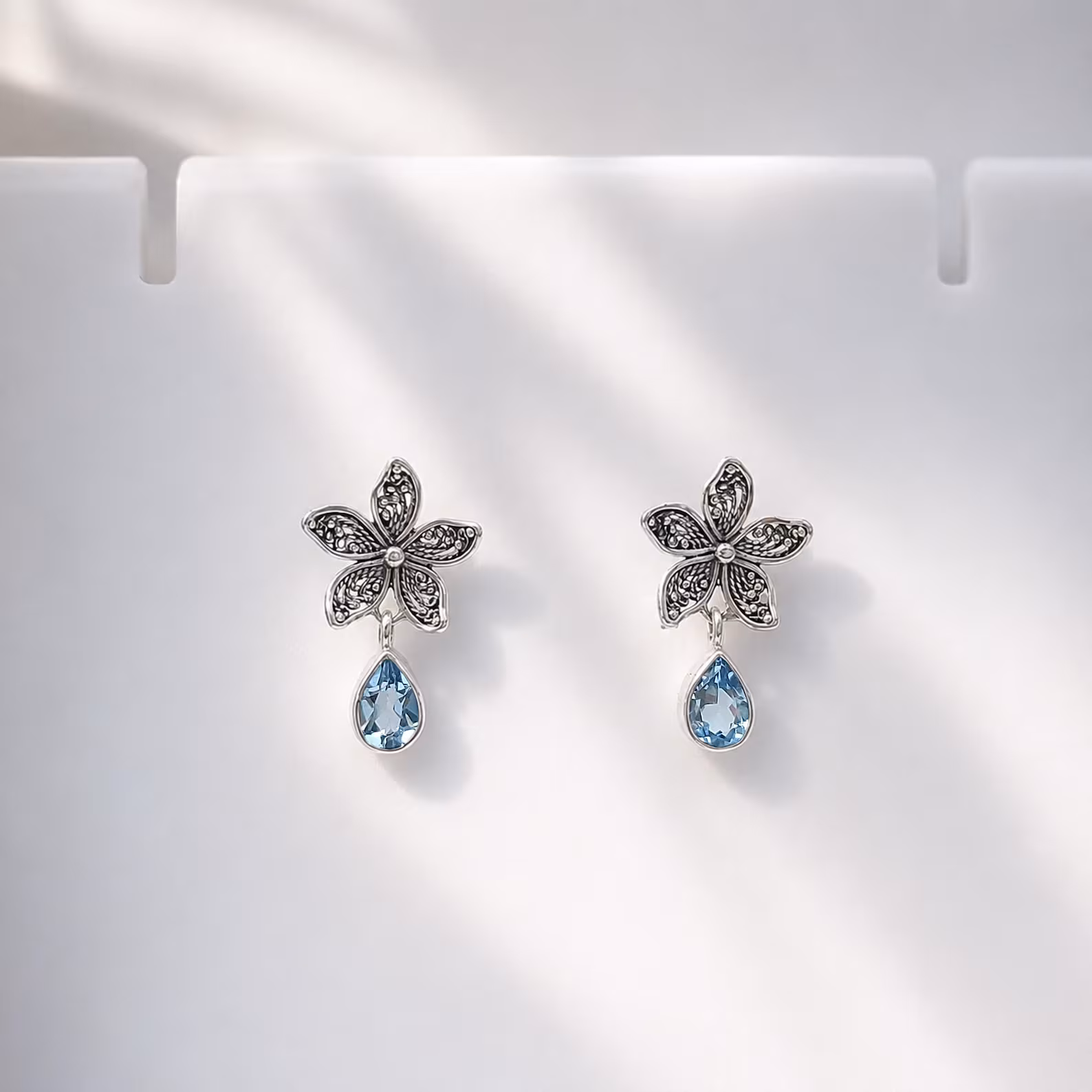 Traditional Bali Sterling Silver Floral Dangle Earrings 925 sterling silver flower earrings with gemstone close up